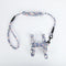 Floral-patterned dog harness and leash set on a white background