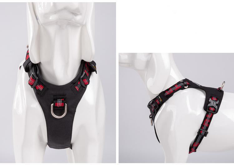 Black dog harness with red plaid pattern on a mannequin against a white background.