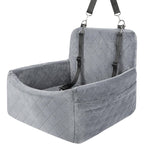Gray quilted pet seat carrier with straps on a white background
