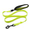Neon green dog leash with black clip on a white background