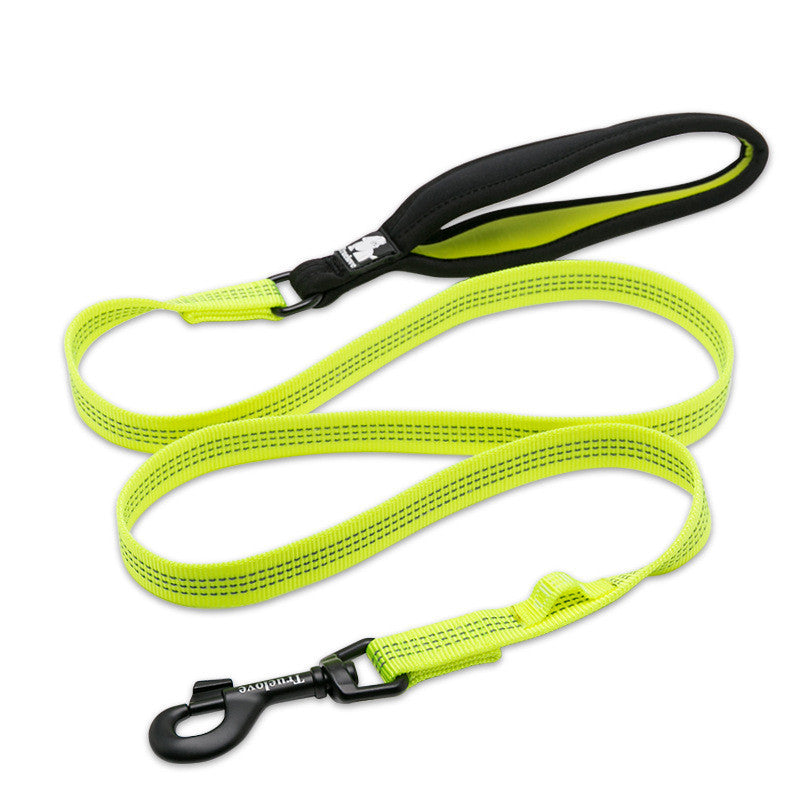 Neon green dog leash with black clip on a white background