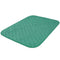 Green quilted mat on a white background