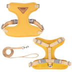 Yellow dog harness and leash set with 'DUOMM' branding on a white background.
