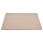 Beige bath mat on a white background