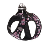 Floral patterned dog harness on a white background