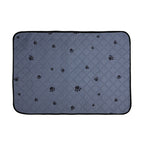 Gray pet mat with black paw print pattern on a white background