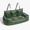 Green inflatable sofa with cushions on a white background