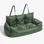 Green inflatable sofa with cushions on a white background