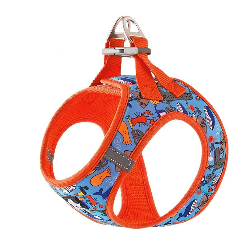 Dog harness with blue pattern and orange trim on a white background
