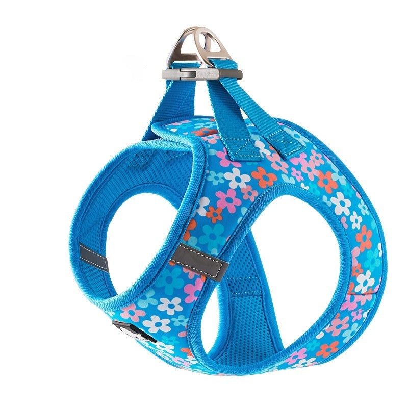 Blue floral-patterned dog harness on a white background