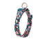 Floral-patterned dog harness on a white background