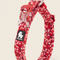 Red floral-patterned dog collar with a brand label on a white background