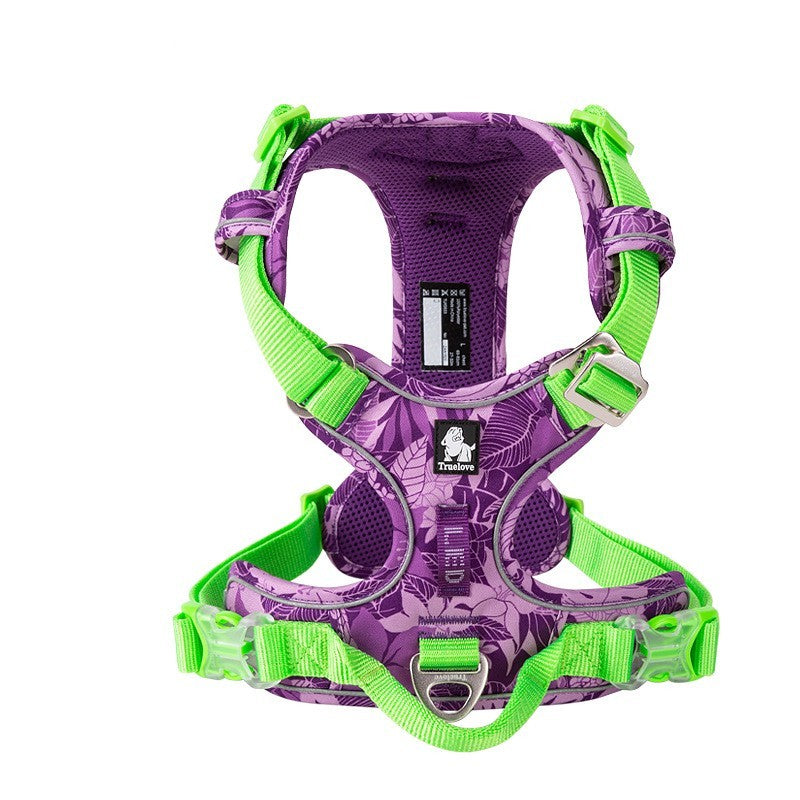 Purple and green dog harness on a white background
