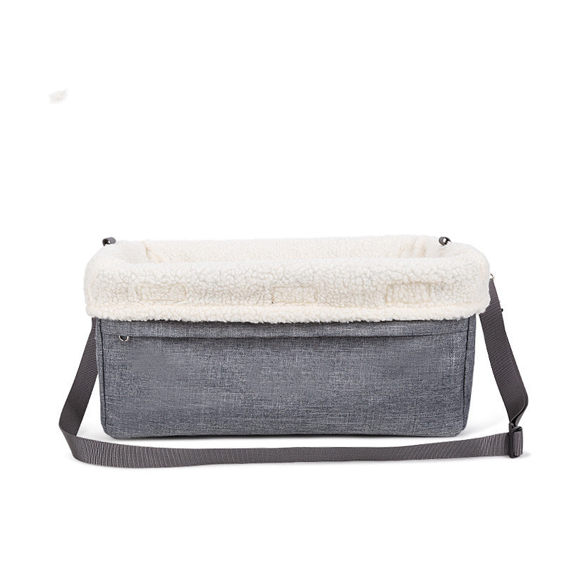 Gray fabric bag with a white fur top on a white background